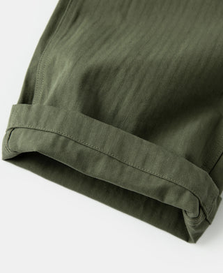 Olive utility pants hem with banded cuff detail