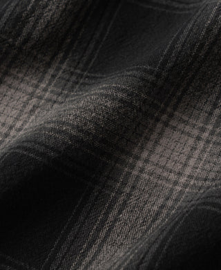 Brushed cotton ombre check fabric close-up in dark gray and black