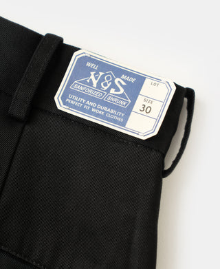 Black trousers waistband label with size 30 and inner facing details