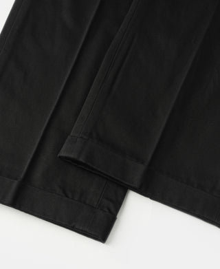 Black single-pleat trousers with front pleats and straight hem panel