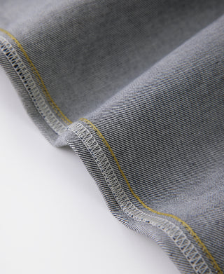Prewashed selvedge denim cuff with detailed woven seam edging