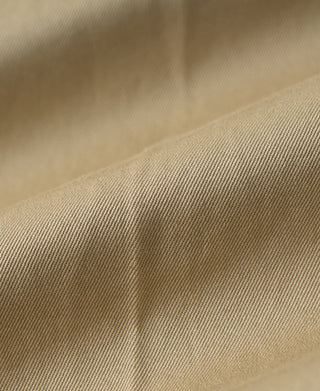 Khaki cotton twill fabric close-up with fine woven texture