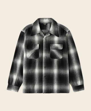Black-and-white ombre check sports shirt with button front and flap pockets