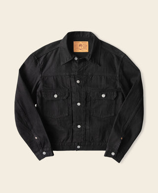 Black denim Type 2 jacket with button front and chest flap pockets