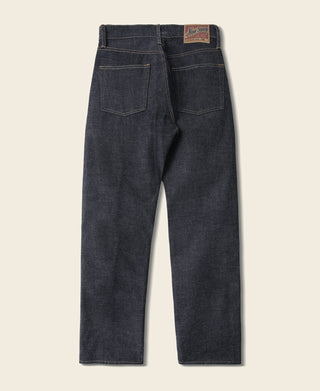 Indigo selvedge denim jeans with back yoke, two back pockets, and belt loops