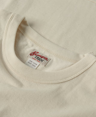 Apricot tubular athletic T-shirt, crew neck with stitched collar and brand label