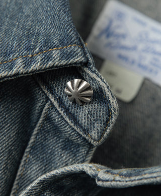 Denim shirt snap button with decorative stitch on shoulder seam