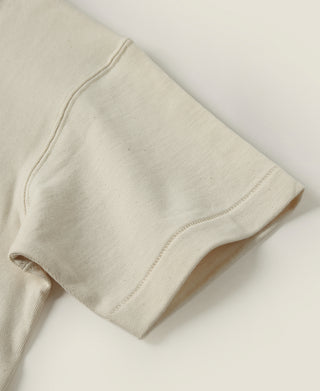 Apricot athletic T-shirt sleeve hem and side seam detail