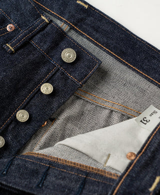 Button fly area with metal buttons and light interior pocket label
