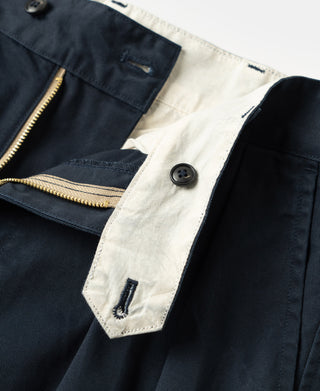 Navy trousers with front coin pocket and beige pocket lining