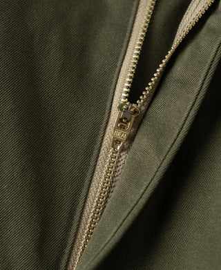 Olive cotton twill fly with brass zipper and engraved zipper pull