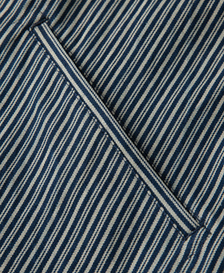 Striped cossack jacket diagonal seam and pocket edge close-up