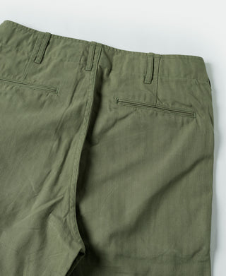 Olive fatigue trousers front with button fly, belt loops and slash pocket