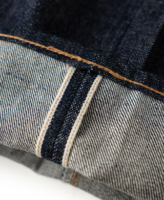 Selvedge denim cuff with narrow white stripe seam detail
